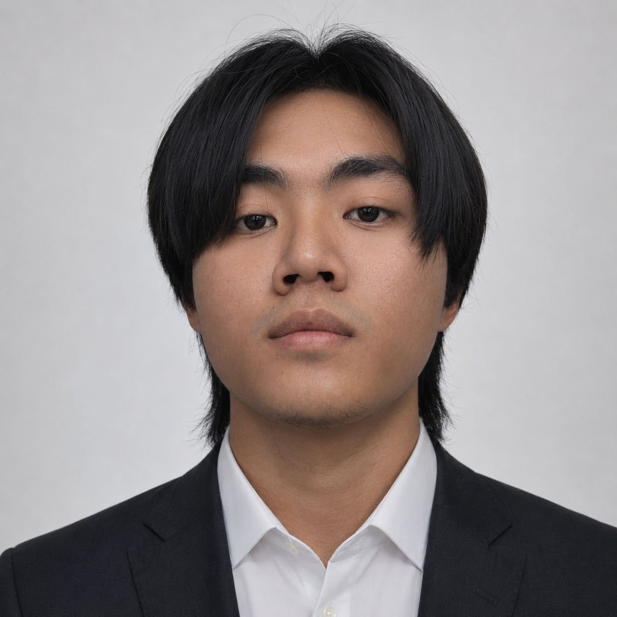 Portrait of Van Michael Gestiada wearing a black suit and white shirt